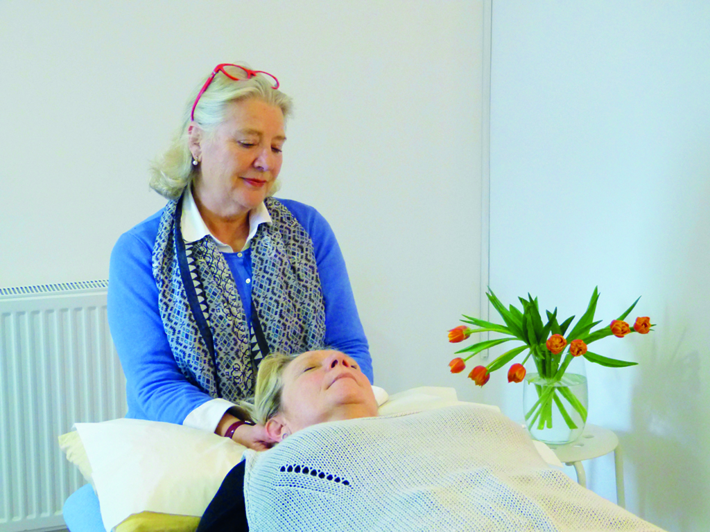 Craniosacral practitioner Caroline Lawrence at work