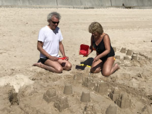 Alastair and Marilyn play on the beach in Jersey