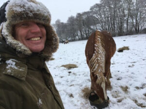 Cameron and horse in the snow